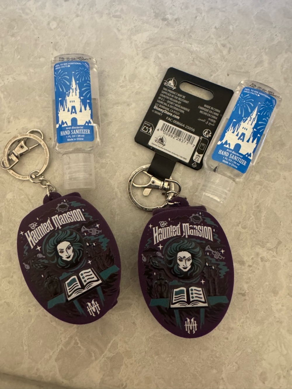 Disney Haunted Mansion Purple Hand Sanitizer Keychain Holder Set